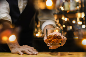 Bartender pouring Whiskey, on  bar,