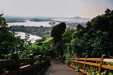Obraz premium Stairs to climb Seongsan mountain in Jeju Island, South Korea.