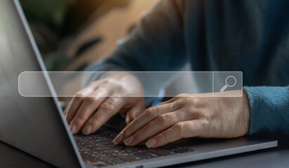 Searching browsing Internet data Information with blank search bar.Search engine optimization SEO networking concept.handof businessman working with computer laptop on desk in office