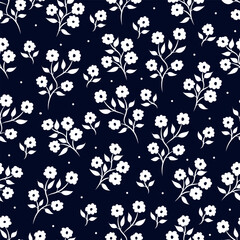Ditsy floral seamless pattern with small white flowers 