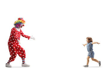 Little girl running towards a clown with arms wide open