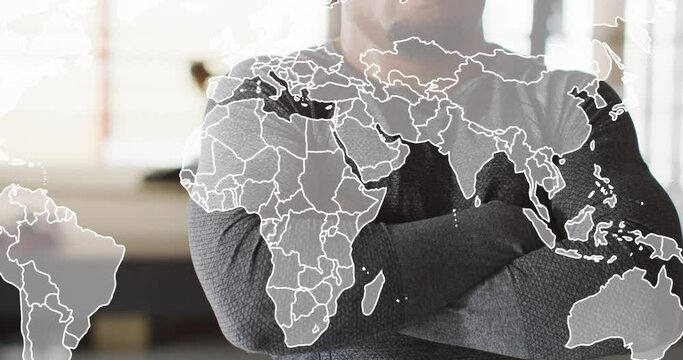Animation of world map over fit african american man in boxing gym