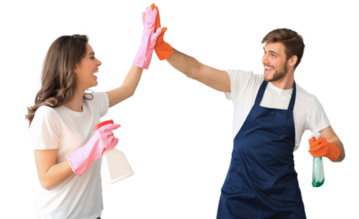 Young happy couple is having fun while doing cleaning at home on a transparent background.