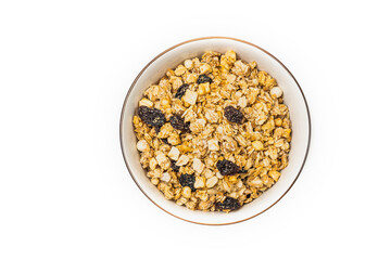 Muesli bowl isolated on white background, top view