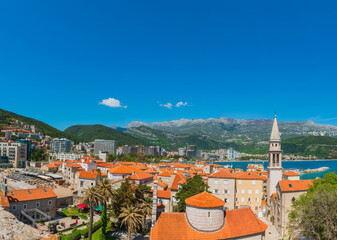 Red roofs of the old town in Budva. View from the ancient citadel - 612776531