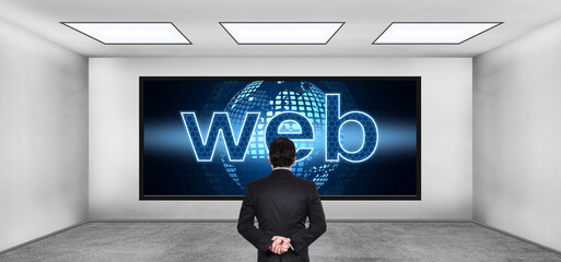 Businessman looking on futuristic web hologram with digital earth