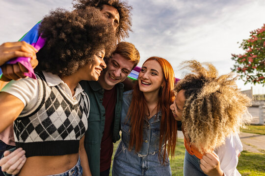 Diverse young friends celebrating gay pride festival - LGBTQ community concept