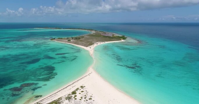 Aerial shot high fly over cayo de agua lonely island with sandbar, los Roques Archipelago 