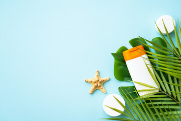 Sun screen products on tropical background. Sun protection. Flat lay image with space for text.