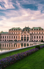 Belvedere palace in Vienna at pink sunset and beautiful clouds