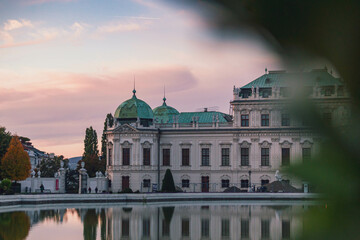 Belvedere palace in Vienna at pink sunset and beautiful clouds