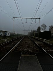 Fototapeta premium railroad tracks in the fog