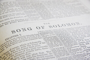 Chapter of the bible, holy book. Song of Solomon page detail. Close-up page detail biblical text. 