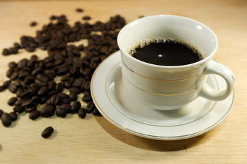 Cup of coffee with beans