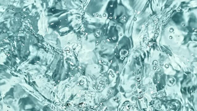 Clear water surface texture with splashes and bubbles.