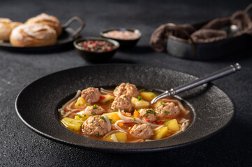 Meatballs soup, romanian traditional food. Ciorba de perisoare. Horizontal.