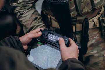 Ukrainian drone operator working with a tablet
