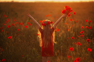 a girl in a poppy field