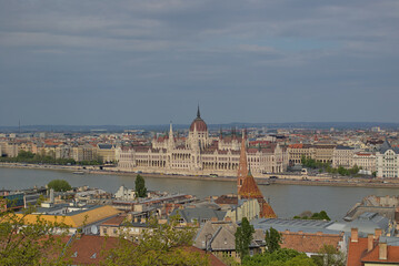 Fototapeta na wymiar Budapest, Hungary - The famous building of the Hungarian Parliament and the Danube river in the cityscape of Budapest. Main tourist attraction.