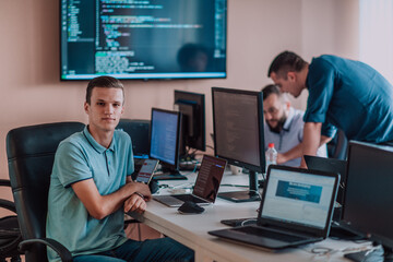 Programmers engrossed in deep collaboration, diligently working together to solve complex problems...