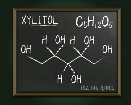 Molecular structure of a sweetener Xylitol on a blackboard in school.
