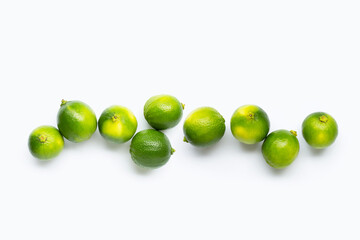 Fresh limes isolated on white