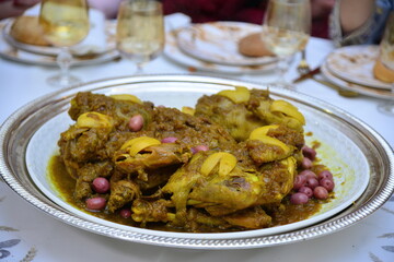 Moroccan chicken with lemon and olives is served at weddings