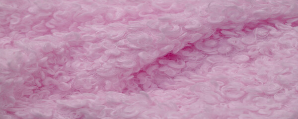 Faux fur in pale pink color. Imitation of karakul lamb skin. known as fleecy fabric, which...
