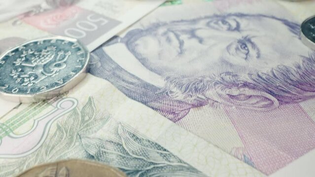 Czech crowns cash money macro background. Ceska koruna. Banknotes and coins,neon