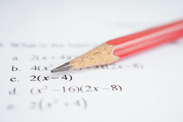 Answer sheets with pencil drawing fill to select choice, education concept.