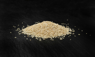 Sesame Seeds, White Sesamum Grains, Healthy Diet Garnish, Sesame Seeds on Black