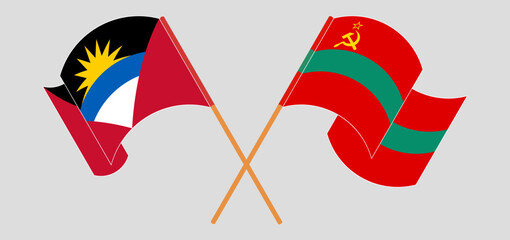 Crossed and waving flags of Antigua and Barbuda and Transnistria