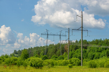 Silhouette of high voltage poles, power tower, electricity pylon, steel trellised tower, in the afternoon in the European part. Texture high voltage pillar, overhead power line