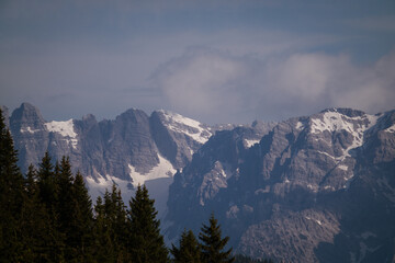 beautiful view of the alps in the salzburger mountains in austria at a cloudy and sunny summer day