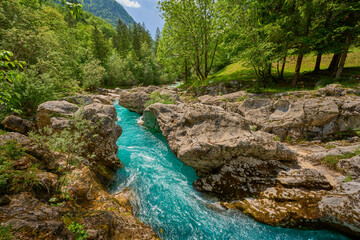 wild canyon with cristal clear turquoise water in the Soca valley, Trigalv National Park near...