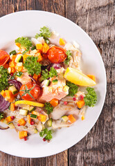 fish fillet cooked with vegetables