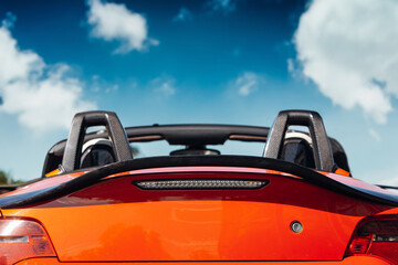 Sports convertible car on a bright summer day going on the trip