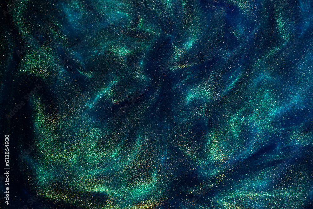 Wall mural various stains and overflows of gold particles in blue fluid with green tints. golden particles dust