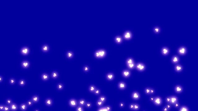 Pink glowing heart shape particles moving up on dark blue background. Happy Valentine’s day. Happy mother’s day, Abstract background.