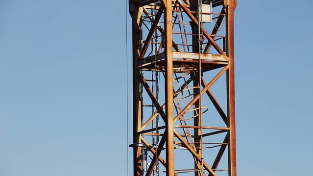 Construction tower cranes on a building site Isolated