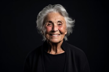 Headshot portrait photography of a happy old woman giving a hug to the camera against a dark grey background. With generative AI technology