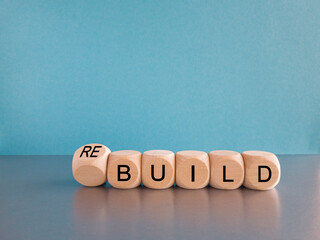 Time to rebuild symbol. Turned wooden cubes and changes the word 'build' to 'rebuild'. Beautiful...