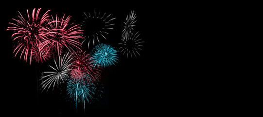 Red and Blue Fireworks on Black background