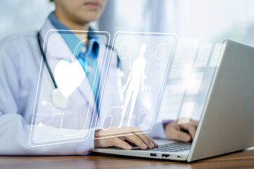 Doctor using computer working in hospital, Doctor using computer checking data patient document, Doctor using computer for health care hospital background