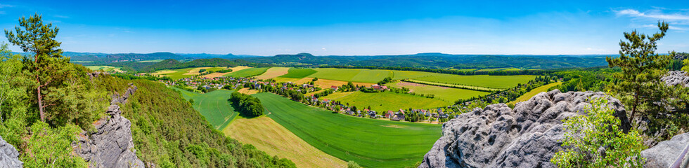 Panoramic over sandstone rocks and valley viewed from Papststein and top bird view at the hiking...