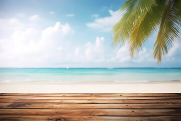 The wooden table above the beach and the palm leaves with a blurry background,