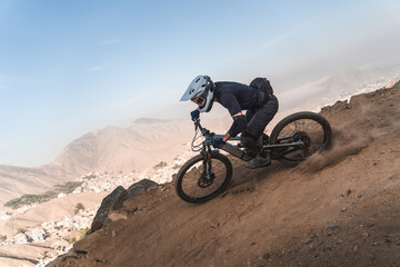 cyclist practicing mountain biking, enduro.