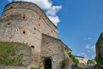 Fototapeta na wymiar Old stone medieval Stephen Bathory Gate in Kamianets-Podilskyi fortress, Ukraine.