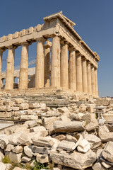 the Parthenon is a Greek temple that stands on the acropolis of Athens, dedicated to the goddess Athena, protector of the city.