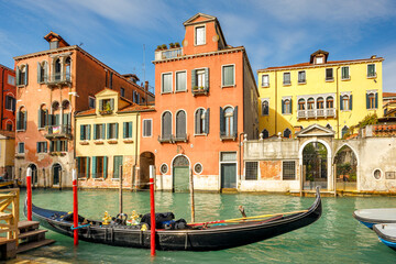Obraz na płótnie Canvas Gondola in a canal of the old town of Venice, Italy, Europe.
